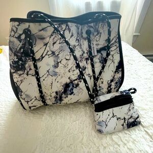 Ah.dorned neoprene tote with wallet